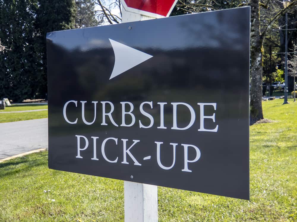 Angled view of a curbside pickup sign