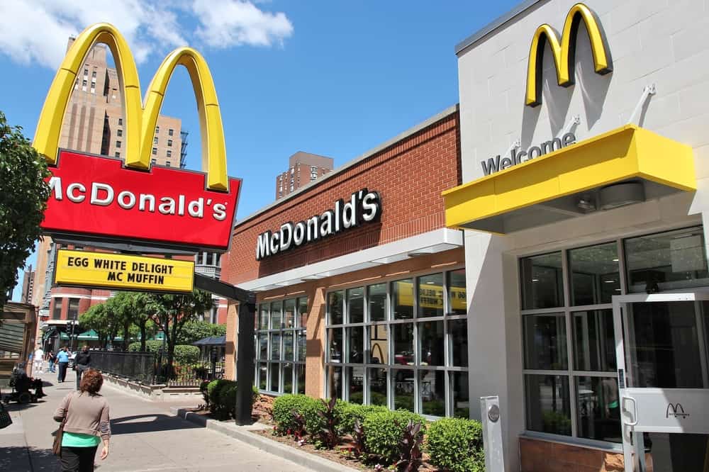 People walk by McDonald's restaurant in Chicago